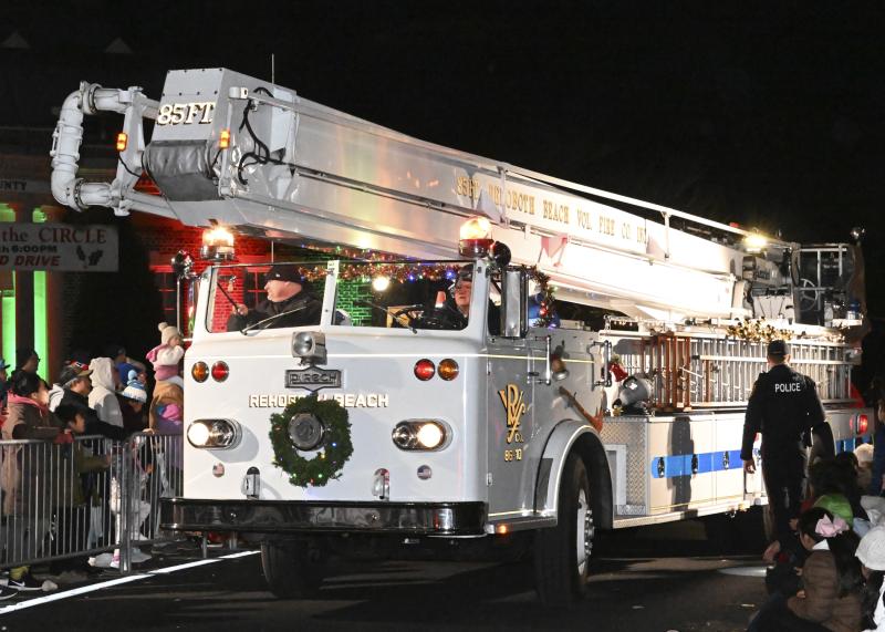 Rehoboth Beach Volunteer Fire Company makes the journey with its 1964 open cab Pirsch snorkel.